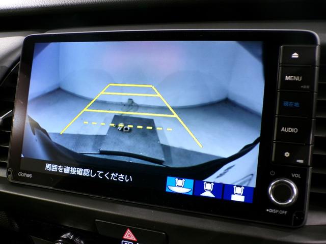 フィット ｅ：ＨＥＶクロスター　Ｂｌｕｅｔｏｏｔｈ接続ドラレコＥＴＣインターナビフルセグＴＶ純正アルミホイールスマートキー　ワンセグＴＶ　衝突回避システム　禁煙　１オーナー　フルオートエアコン　整備記録簿　前後センサー　ＬＥＤランプ（9枚目）