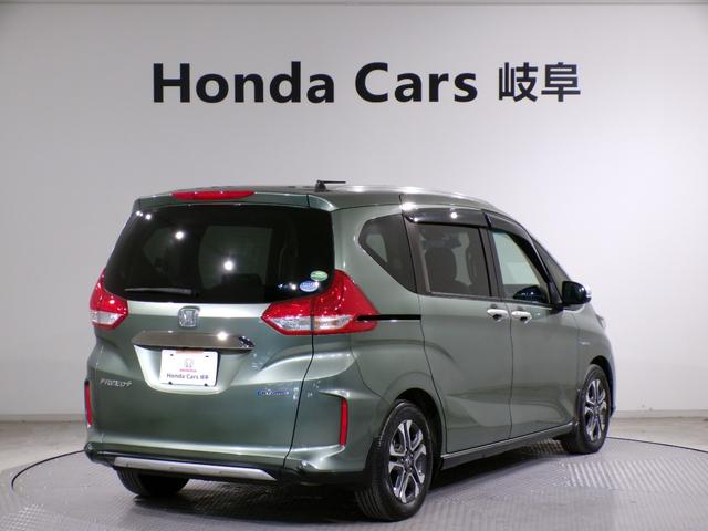 フリード+ハイブリッド ハイブリッド・クロスターホンダセンシング Bluetooth接続両側電動スライドドアドラレコETCインターナビフルセグTV純正アルミホイールスマートキー 禁煙 バックカメラ シートヒーター 地デジフルセグ 両側電動ドア サイドエアバッグ(2枚目)