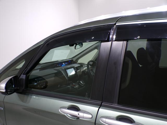 フリード+ハイブリッド ハイブリッド・クロスターホンダセンシング Bluetooth接続両側電動スライドドアドラレコETCインターナビフルセグTV純正アルミホイールスマートキー 禁煙 バックカメラ シートヒーター 地デジフルセグ 両側電動ドア サイドエアバッグ(12枚目)