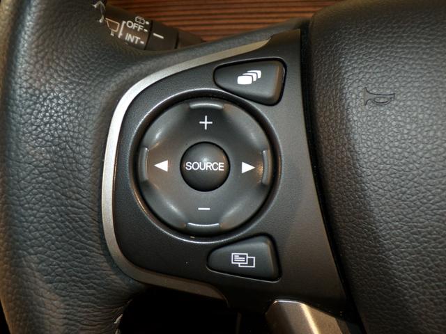 フリード+ハイブリッド ハイブリッド・クロスターホンダセンシング Bluetooth接続両側電動スライドドアドラレコETCインターナビフルセグTV純正アルミホイールスマートキー 禁煙 バックカメラ シートヒーター 地デジフルセグ 両側電動ドア サイドエアバッグ(16枚目)