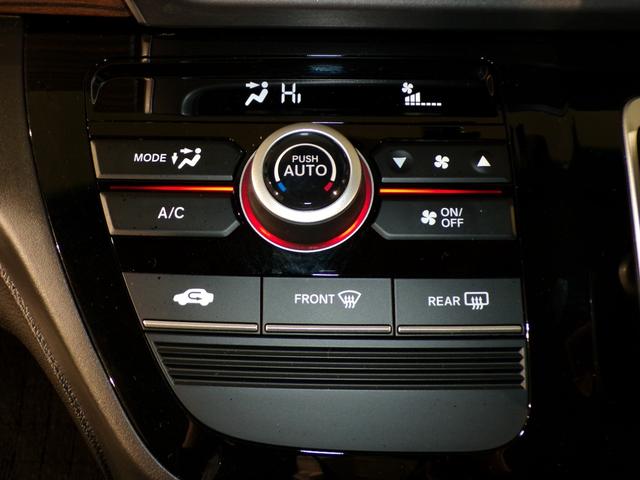 フリード+ハイブリッド ハイブリッド・クロスターホンダセンシング Bluetooth接続両側電動スライドドアドラレコETCインターナビフルセグTV純正アルミホイールスマートキー 禁煙 バックカメラ シートヒーター 地デジフルセグ 両側電動ドア サイドエアバッグ(18枚目)