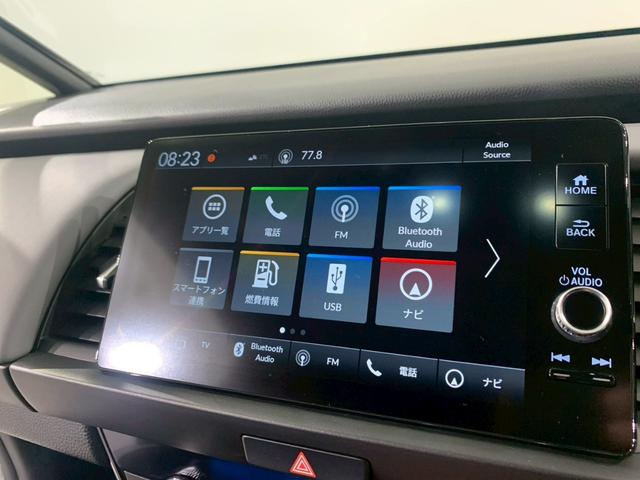 フィット ｅ：ＨＥＶＲＳ　当社デモカー　ドラレコ　フルセグＴＶ　ＡＷ　エアバッグ　ナビ＆ＴＶ　パワーウィンドウ　助手席エアバッグ　Ｄレコ　フルセグテレビ　ＬＥＤヘッドランプ　フルオートエアコン　ＥＴＣ装備　禁煙　スマートキ（9枚目）