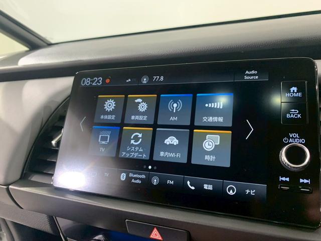 フィット ｅ：ＨＥＶＲＳ　当社デモカー　ドラレコ　フルセグＴＶ　ＡＷ　エアバッグ　ナビ＆ＴＶ　パワーウィンドウ　助手席エアバッグ　Ｄレコ　フルセグテレビ　ＬＥＤヘッドランプ　フルオートエアコン　ＥＴＣ装備　禁煙　スマートキ（10枚目）