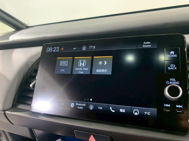 フィット ｅ：ＨＥＶＲＳ　当社デモカー　ドラレコ　フルセグＴＶ　ＡＷ　エアバッグ　ナビ＆ＴＶ　パワーウィンドウ　助手席エアバッグ　Ｄレコ　フルセグテレビ　ＬＥＤヘッドランプ　フルオートエアコン　ＥＴＣ装備　禁煙　スマートキ（11枚目）