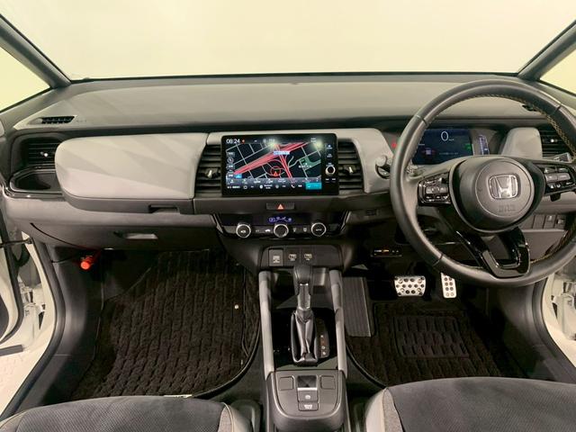 フィット ｅ：ＨＥＶＲＳ　当社デモカー　ドラレコ　フルセグＴＶ　ＡＷ　エアバッグ　ナビ＆ＴＶ　パワーウィンドウ　助手席エアバッグ　Ｄレコ　フルセグテレビ　ＬＥＤヘッドランプ　フルオートエアコン　ＥＴＣ装備　禁煙　スマートキ（19枚目）