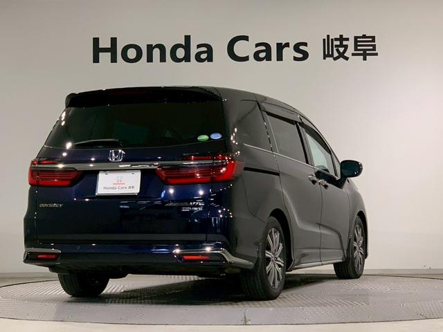 オデッセイハイブリッド ｅ：ＨＥＶアブソルート　フルセグＴＶ　ＡＷ　両側電動スライドドア　メモリナビ　サイドカーテンエアバック　衝突被害軽減ブレーキ　ＬＥＤヘッドランプ　記録簿　クリアランスソナー　両電動ドア　禁煙　ＤＶＤ　バックカメラ　３列シート（2枚目）