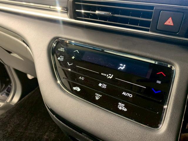 オデッセイハイブリッド ｅ：ＨＥＶアブソルート　フルセグＴＶ　ＡＷ　両側電動スライドドア　メモリナビ　サイドカーテンエアバック　衝突被害軽減ブレーキ　ＬＥＤヘッドランプ　記録簿　クリアランスソナー　両電動ドア　禁煙　ＤＶＤ　バックカメラ　３列シート（12枚目）