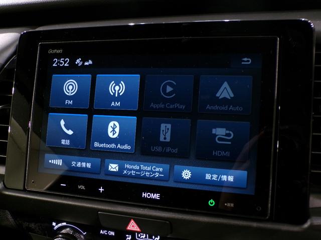 フィット ｅ：ＨＥＶホーム　Ｂｌｕｅｔｏｏｔｈ接続ドラレコＥＴＣスマートキー　前後誤発進抑制機能　助手席エアバッグ　運転席エアバッグ　１オナ　アイドリングストップ　禁煙　ＬＥＤライト　バックカメラ　ＡＢＳ　サイドエアバッグ（4枚目）