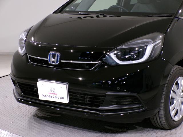 フィット ｅ：ＨＥＶホーム　Ｂｌｕｅｔｏｏｔｈ接続ドラレコＥＴＣスマートキー　前後誤発進抑制機能　助手席エアバッグ　運転席エアバッグ　１オナ　アイドリングストップ　禁煙　ＬＥＤライト　バックカメラ　ＡＢＳ　サイドエアバッグ（52枚目）