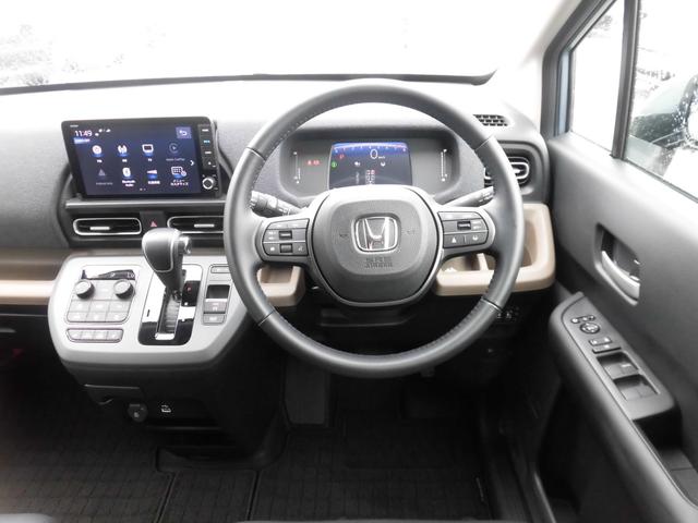 フリード エアーEX 当社元デモカー 純正9インチ・コネクト対応ナビ ブラインドスポットインフォメーション 両側電動スライドドア リアクーラー シートヒーター カーテンエアバッグ フルセグTV Bluetoothオーディオ(3枚目)