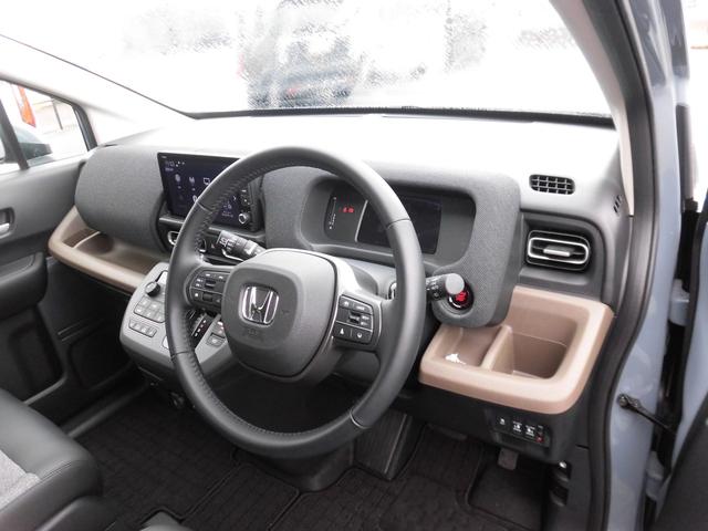 フリード エアーEX 当社元デモカー 純正9インチ・コネクト対応ナビ ブラインドスポットインフォメーション 両側電動スライドドア リアクーラー シートヒーター カーテンエアバッグ フルセグTV Bluetoothオーディオ(25枚目)