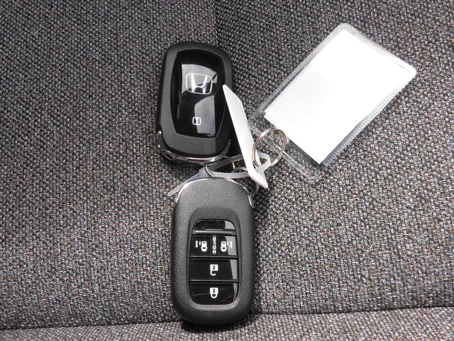 フリード エアーEX 元試乗車 純正ナビ ホンダセンシング LEDヘッドライトETC バックモニター リアクーラー 盗難防止システム 両側パワースライドドア 横滑り防止装置 クルコン フルセグ ETC車載器 オートエアコン(12枚目)