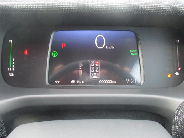 フリード ｅ：ＨＥＶエアー　ＥＸ　スマートキー、衝突防止機能、両側電動スライドドア、ステアリングスイッチ、電子パーキング、リタクーラー、オートライト、シートヒーター、３列シート、コネクト機能、ホンダセンシング、リヤカメラ（22枚目）