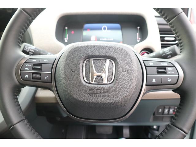 フリード ｅ：ＨＥＶエアー　ＥＸ　ＤＡＭＤ　ＩＳＯＬＡＴＯＲ　ダムドアイソレーター　フェイスチェンジキット　登録済み未使用車　７人乗り　パールホワイト　両側パワースライドドア（18枚目）