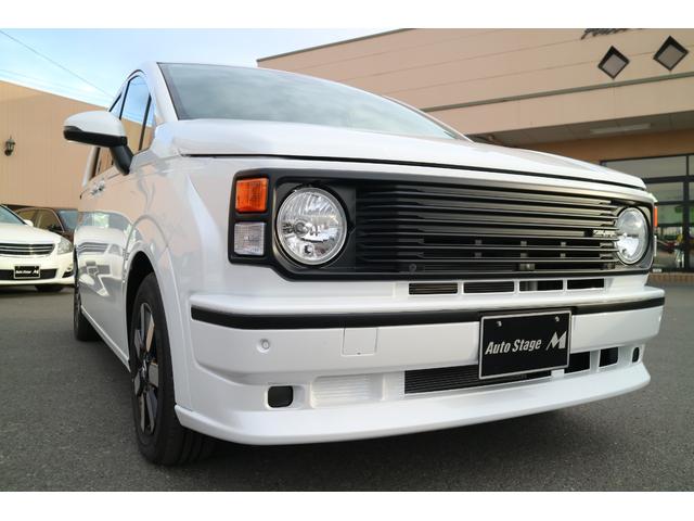 フリード ｅ：ＨＥＶエアー　ＥＸ　ＤＡＭＤ　ＩＳＯＬＡＴＯＲ　ダムドアイソレーター　フェイスチェンジキット　登録済み未使用車　７人乗り　パールホワイト　両側パワースライドドア（30枚目）