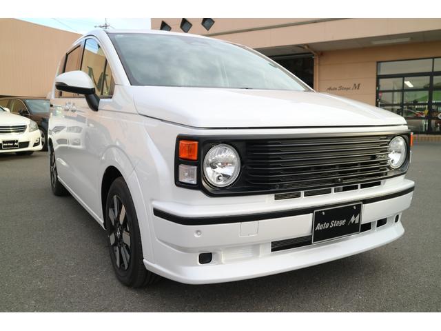 フリード ｅ：ＨＥＶエアー　ＥＸ　ＤＡＭＤ　ＩＳＯＬＡＴＯＲ　ダムドアイソレーター　フェイスチェンジキット　登録済み未使用車　７人乗り　パールホワイト　両側パワースライドドア（31枚目）