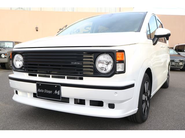 フリード ｅ：ＨＥＶエアー　ＥＸ　ＤＡＭＤ　ＩＳＯＬＡＴＯＲ　ダムドアイソレーター　フェイスチェンジキット　登録済み未使用車　７人乗り　パールホワイト　両側パワースライドドア（33枚目）