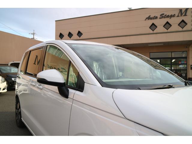 フリード ｅ：ＨＥＶエアー　ＥＸ　ＤＡＭＤ　ＩＳＯＬＡＴＯＲ　ダムドアイソレーター　フェイスチェンジキット　登録済み未使用車　７人乗り　パールホワイト　両側パワースライドドア（40枚目）