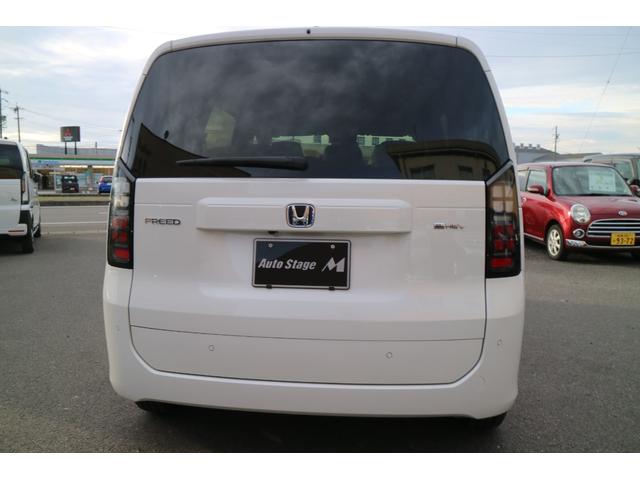 フリード ｅ：ＨＥＶエアー　ＥＸ　ＤＡＭＤ　ＩＳＯＬＡＴＯＲ　ダムドアイソレーター　フェイスチェンジキット　登録済み未使用車　７人乗り　パールホワイト　両側パワースライドドア（48枚目）