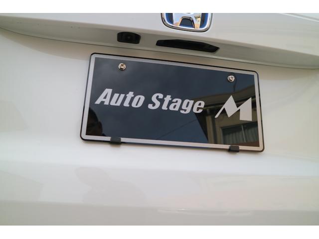 フリード ｅ：ＨＥＶエアー　ＥＸ　ＤＡＭＤ　ＩＳＯＬＡＴＯＲ　ダムドアイソレーター　フェイスチェンジキット　登録済み未使用車　７人乗り　パールホワイト　両側パワースライドドア（49枚目）