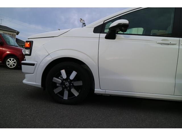 フリード ｅ：ＨＥＶエアー　ＥＸ　ＤＡＭＤ　ＩＳＯＬＡＴＯＲ　ダムドアイソレーター　フェイスチェンジキット　登録済み未使用車　７人乗り　パールホワイト　両側パワースライドドア（56枚目）