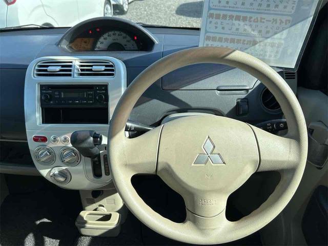 eKワゴン M キーレスエントリー 電動格納ミラー ベンチシート AT 盗難防止システム CD 衝突安全ボディ エアコン パワーステアリング パワーウィンドウ 運転席エアバッグ(3枚目)