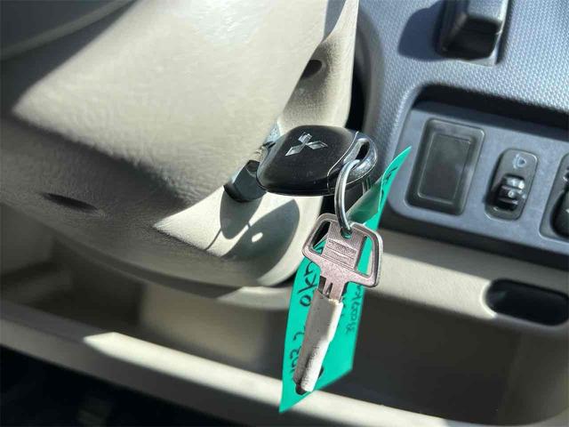 eKワゴン M キーレスエントリー 電動格納ミラー ベンチシート AT 盗難防止システム CD 衝突安全ボディ エアコン パワーステアリング パワーウィンドウ 運転席エアバッグ(26枚目)