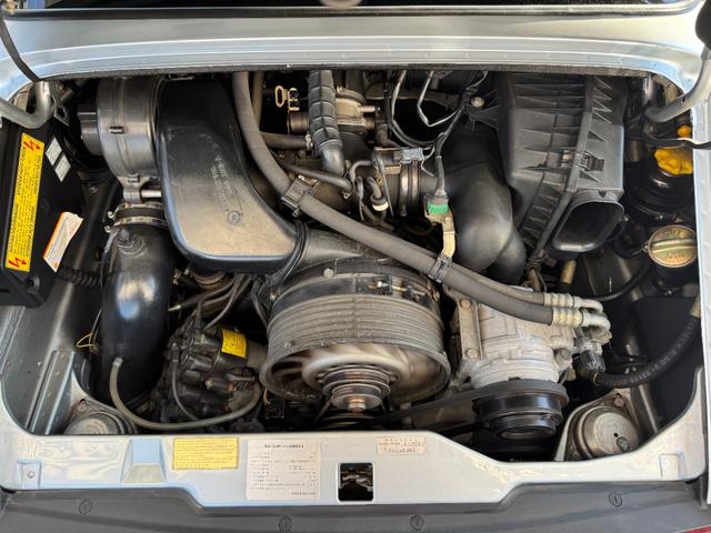 911 911カレラ D車 電動シート カラークレスト レザーステアリング ブラックキャリパー コンチネンタル製オーディオ カラークレストセンターキャップ(27枚目)