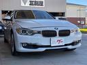 3シリーズ 320i バックカメラ ナビ クリアランスソナー アルミホイール オートライト HID パワーシート スマートキー アイドリングストップ 電動格納ミラー シートヒーター AT 盗難防止システム ABS ESC 中古車画像_2
