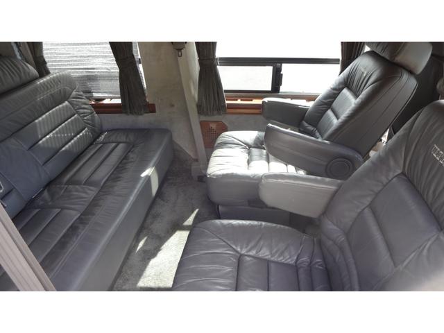 シボレーアストロ アメリカンロード　新車並行・・実走行・ハイルーフ・ツインエアコン・社外キーレス・１５インチデイトナホイール・キャプテンシート・３列目電動フルフラットシート・レザーシート・観音開き（25枚目）