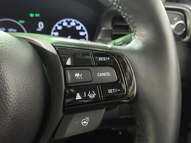 ヴェゼル ｅ：ＨＥＶＺ　ギャザズ９インチＳＤナビ　フルセグＴＶ　ＣＤ＆ＤＶＤ再生　ブルートゥース　Ｂカメラ　ＥＴＣ車載器　Ｐセンサー　ＬＥＤオートライト　ワンオーナー　シートヒーター　ステアリングヒーター　Ｐテールゲート（12枚目）