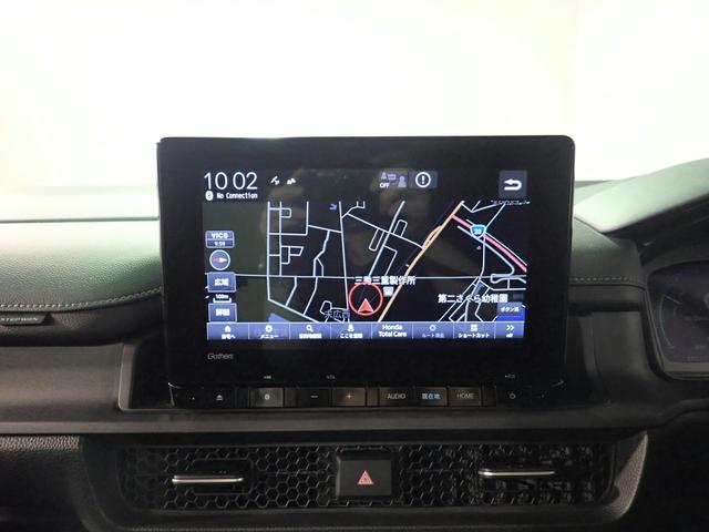 ステップワゴン e:HEVスパーダ ギャザズ9インチナビ フルセグTV CD&DVD再生 ブルートゥース バックカメラ 15.4型フリップダウンモニター 両側電動スライドドア シートヒーター LED ワンオーナー 禁煙車 スマートキー(8枚目)