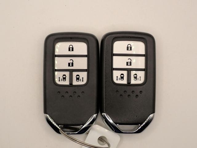 フリード G・ホンダセンシング ギャザズメモリーナビ フルセグTV CD&DVD再生 ブルートゥース バックカメラ ETC車載器 両側電動スライドドア オートライト F&Rドラレコ ワンオーナー 禁煙車 シートヒーター Hセンシング(11枚目)