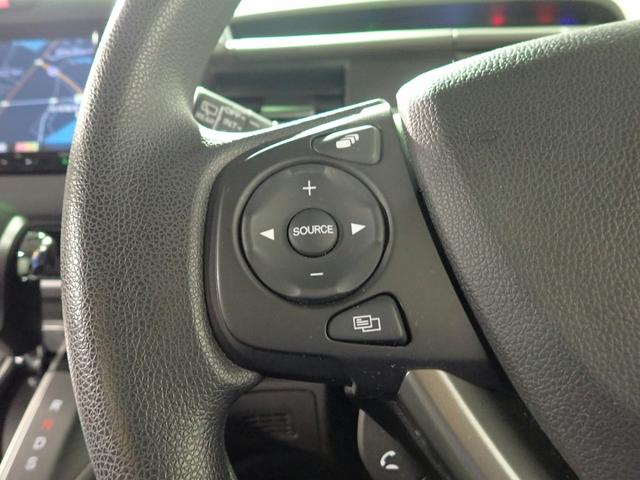 フリード G・ホンダセンシング ギャザズメモリーナビ フルセグTV CD&DVD再生 ブルートゥース バックカメラ ETC車載器 両側電動スライドドア オートライト F&Rドラレコ ワンオーナー 禁煙車 シートヒーター Hセンシング(18枚目)