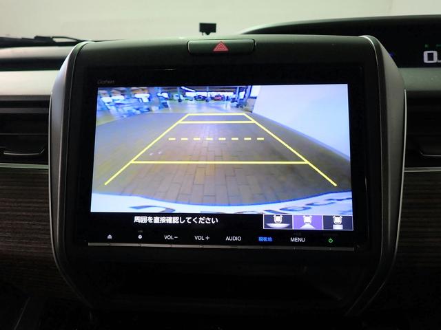 フリードハイブリッド ハイブリッド・クロスターホンダセンシング　ギャザズ９インチメモリーナビ　フルセグＴＶ　ＣＤ＆ＤＶＤ再生　ブルートゥース　バックカメラ　ＥＴＣ車載器　両側電動スライドドア　シートヒーター　ＬＥＤオートライト　ワンオーナー　ドラレコ前後（8枚目）