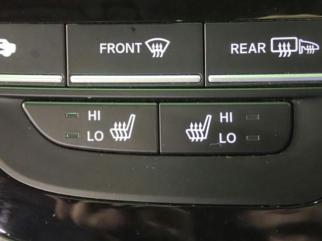 フリードハイブリッド ハイブリッド・クロスターホンダセンシング　ギャザズ９インチメモリーナビ　フルセグＴＶ　ＣＤ＆ＤＶＤ再生　ブルートゥース　バックカメラ　ＥＴＣ車載器　両側電動スライドドア　シートヒーター　ＬＥＤオートライト　ワンオーナー　ドラレコ前後（11枚目）