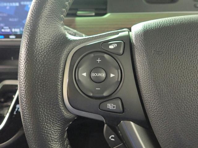 フリードハイブリッド ハイブリッド・クロスターホンダセンシング　ギャザズ９インチメモリーナビ　フルセグＴＶ　ＣＤ＆ＤＶＤ再生　ブルートゥース　バックカメラ　ＥＴＣ車載器　両側電動スライドドア　シートヒーター　ＬＥＤオートライト　ワンオーナー　ドラレコ前後（18枚目）