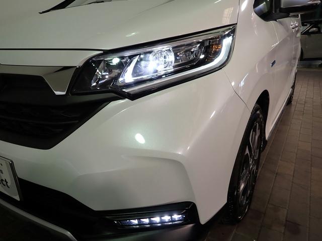 フリードハイブリッド ハイブリッド・クロスターホンダセンシング　ギャザズ９インチメモリーナビ　フルセグＴＶ　ＣＤ＆ＤＶＤ再生　ブルートゥース　バックカメラ　ＥＴＣ車載器　両側電動スライドドア　シートヒーター　ＬＥＤオートライト　ワンオーナー　ドラレコ前後（29枚目）