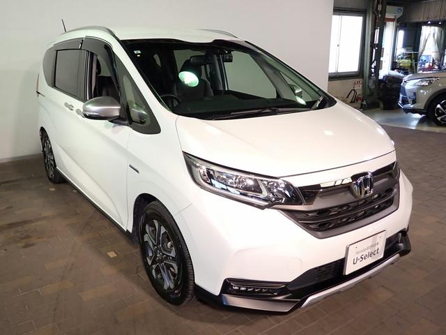 フリードハイブリッド ハイブリッド・クロスターホンダセンシング　ギャザズ９インチメモリーナビ　フルセグＴＶ　ＣＤ＆ＤＶＤ再生　ブルートゥース　バックカメラ　ＥＴＣ車載器　両側電動スライドドア　シートヒーター　ＬＥＤオートライト　ワンオーナー　ドラレコ前後（30枚目）