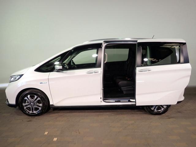 フリードハイブリッド ハイブリッド・クロスターホンダセンシング　ギャザズ９インチメモリーナビ　フルセグＴＶ　ＣＤ＆ＤＶＤ再生　ブルートゥース　バックカメラ　ＥＴＣ車載器　両側電動スライドドア　シートヒーター　ＬＥＤオートライト　ワンオーナー　ドラレコ前後（32枚目）