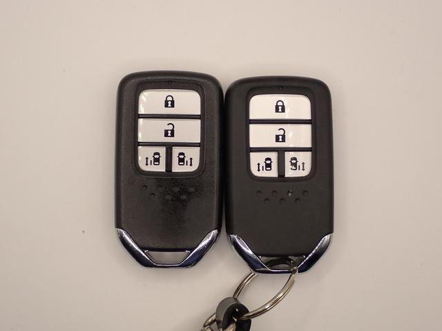 フリード Ｇ　ギャザズメモリーナビ　フルセグＴＶ　ＣＤ＆ＤＶＤ再生　ブルートゥース　バックカメラ　ＥＴＣ車載器　両側電動スライドドア　オートライト　ワンオーナー　禁煙車　ホンダセンシング　レーダークルーズＣ（10枚目）