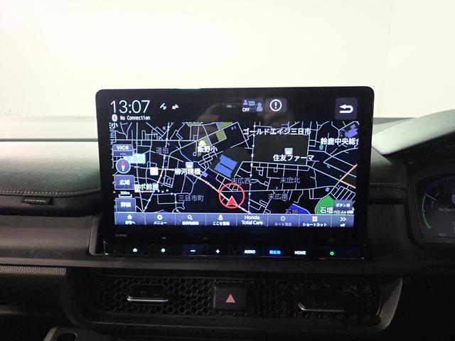 ステップワゴン ｅ：ＨＥＶスパーダ　ギャザズ１１．４インチナビ　フルセグＴＶ　ブルートゥース　天吊りモニター　両側電動スライドドア　シートヒーター　ＬＥＤオートライト　ワンオーナー　禁煙車　Ｐセンサー　パワーテールゲート　ＢＳＩ（8枚目）