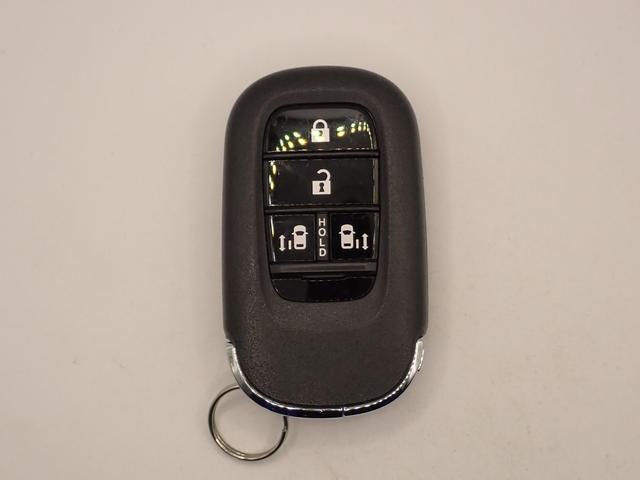 フリード ｅ：ＨＥＶエアーＥＸ　ギャザズ８インチメモリーナビ　フルセグＴＶ　ブルートゥース　バックカメラ　両側電動スライドドア　ＬＥＤオートライト　ワンオーナー　シートヒーター　ハーフレザーシート　パーキングセンサー　ＢＳＩ（10枚目）