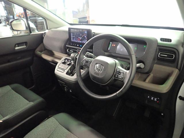 フリード ｅ：ＨＥＶエアーＥＸ　ギャザズ８インチメモリーナビ　フルセグＴＶ　ブルートゥース　バックカメラ　両側電動スライドドア　ＬＥＤオートライト　ワンオーナー　シートヒーター　ハーフレザーシート　パーキングセンサー　ＢＳＩ（22枚目）