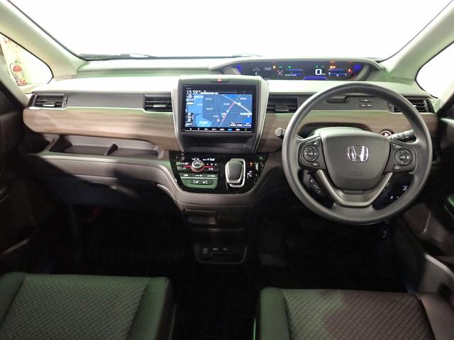 フリードハイブリッド ハイブリッド・G ギャザズ9インチメモリーナビ フルセグTV ブルートゥース バックカメラ 天吊りモニター ETC車載器 両側電動スライドドア シートヒーター LEDオートライト ワンオーナー 禁煙車 純正エンスタ(25枚目)