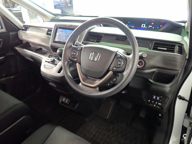 フリード Ｇブラックスタイル　ギャザズメモリーナビ　フルセグＴＶ　ＣＤ＆ＤＶＤ再生　ブルートゥース　バックカメラ　ＥＴＣ２．０　両側電動スライドドア　ＬＥＤオートライト　ワンオーナー　シートヒーター　ホンダセンシング　ドラレコ前後（23枚目）