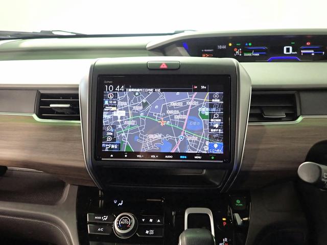 フリードハイブリッド ハイブリッド・Ｇ　ギャザズ９インチメモリーナビ　フルセグＴＶ　ブルートゥース　バックカメラ　ＥＴＣ車載器　両側電動スライドドア　シートヒーター　ＬＥＤオートライト　ワンオーナー　禁煙車　ドラレコ前後　ホンダセンシング（8枚目）