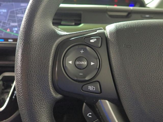 フリードハイブリッド ハイブリッド・Ｇ　ギャザズ９インチメモリーナビ　フルセグＴＶ　ブルートゥース　バックカメラ　ＥＴＣ車載器　両側電動スライドドア　シートヒーター　ＬＥＤオートライト　ワンオーナー　禁煙車　ドラレコ前後　ホンダセンシング（18枚目）