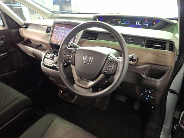 フリードハイブリッド ハイブリッド・Ｇ　ギャザズ９インチメモリーナビ　フルセグＴＶ　ブルートゥース　バックカメラ　ＥＴＣ車載器　両側電動スライドドア　シートヒーター　ＬＥＤオートライト　ワンオーナー　禁煙車　ドラレコ前後　ホンダセンシング（22枚目）