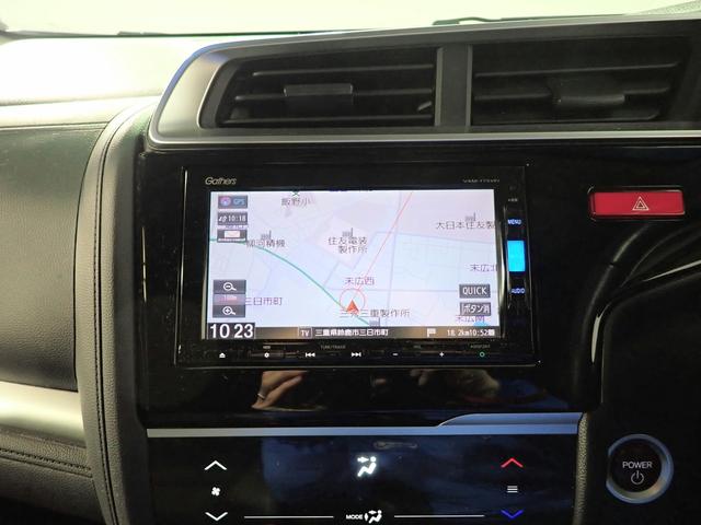 フィットハイブリッド Lパッケージ ギャザズSDナビ フルセグTV CD&DVD再生 ブルートゥース バックカメラ ETC車載器 LEDオートライト ワンオーナー あんしんパッケージ ハーフレザーシート アイドリングストップ(7枚目)